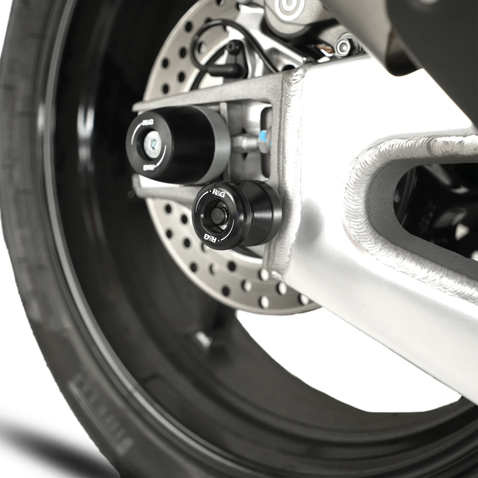 R&G Комплект ролки/адаптори за задна стойка за Aprilia RSV 1000 R (2001–2010), Tuono 1000 R (2003–2011), RSV4 R (2009–2014) и др.