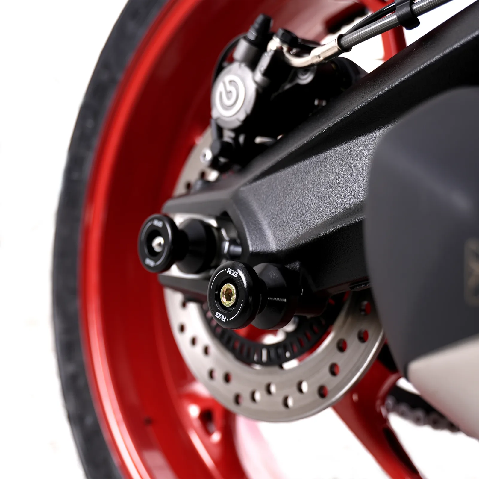 R&G Комплект ролки/адаптори за задна стойка за BMW S 1000 RR (2010+), Triumph Street Triple 675 (2013–2016) и др.
