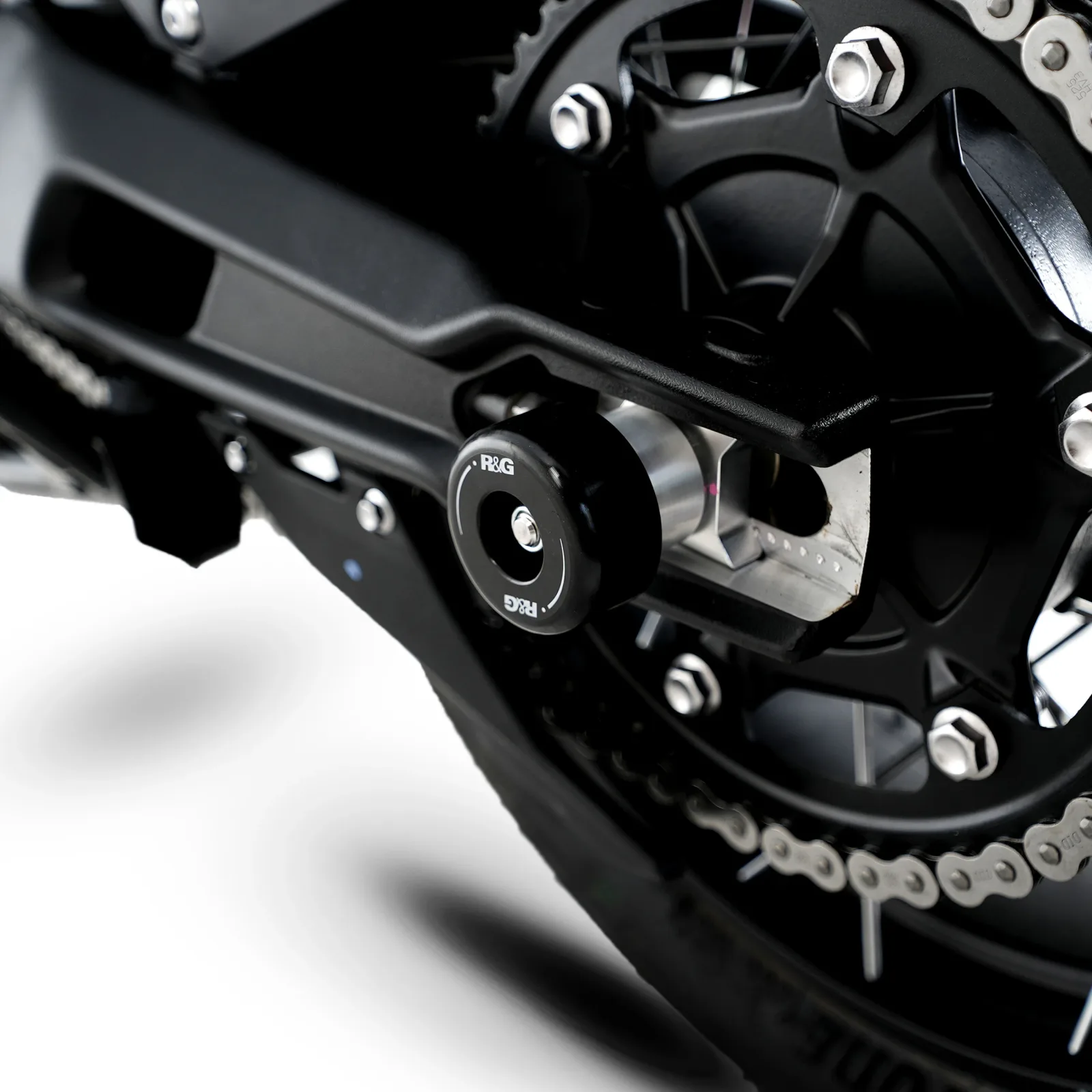 R&G Комплект ролки/адаптори за задна стойка за Triumph Tiger 900 GT (2020, 2024+), Tiger 900 Rally (2020+), Tiger 850 Sport (2021+)