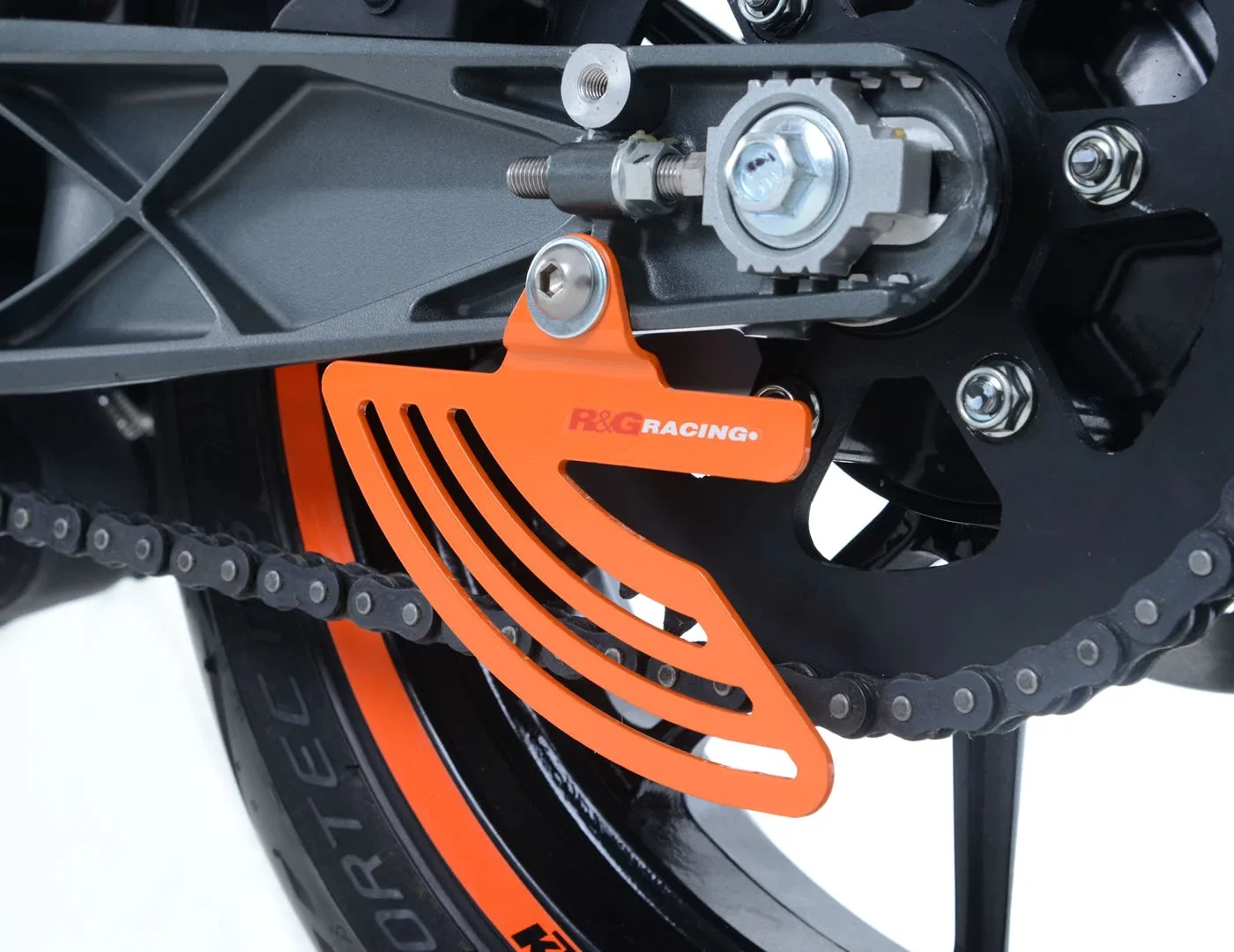 R&G Предпазител за верига „акулска перка“ за KTM RC 125 (2014+), RC 200 (2014–2022), RC 390 (2014+) и др.
