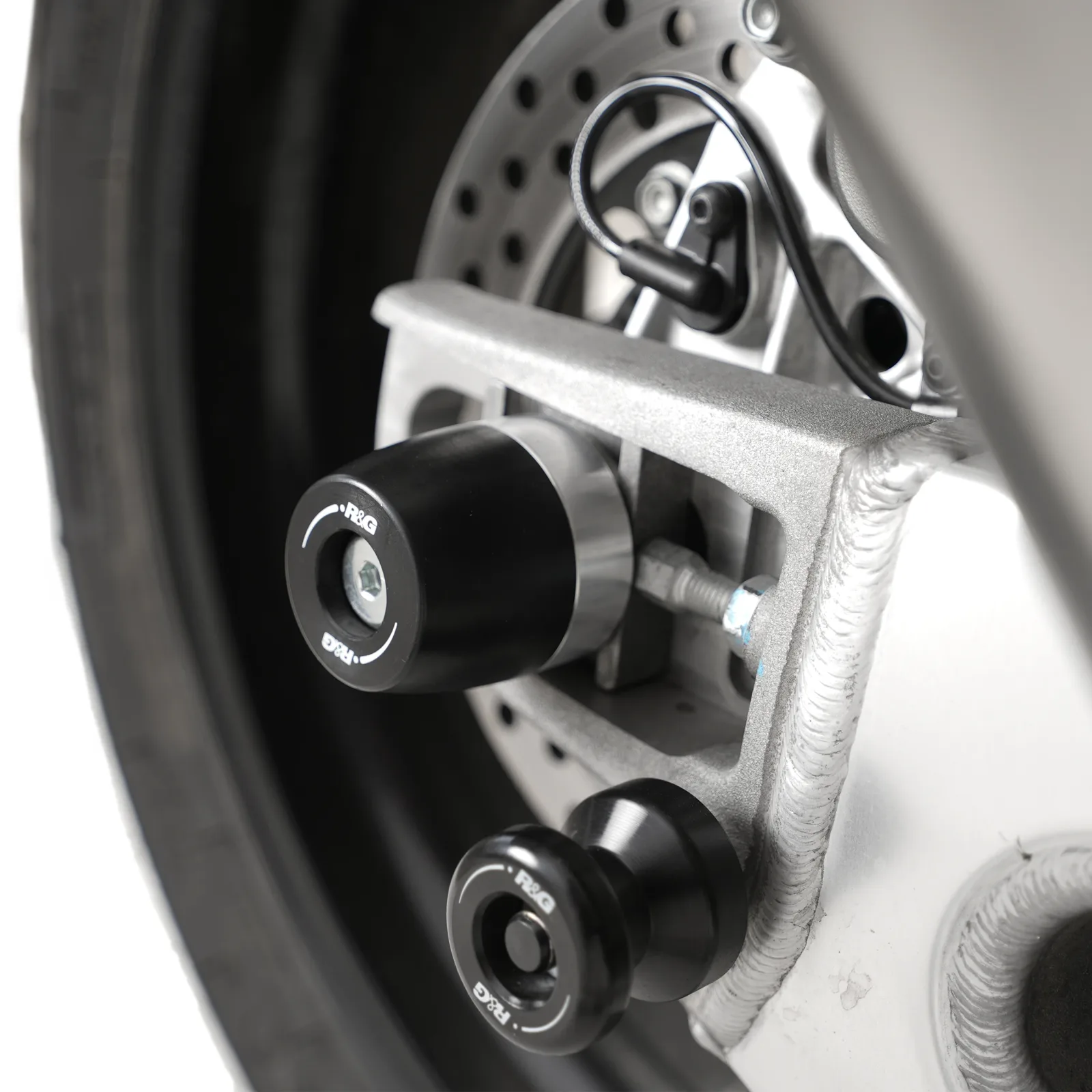 R&G Протектори за шарнир APEX за Aprilia Tuono V4 1100 RR (2025+), Tuono V4 1100 Factory (2025+)