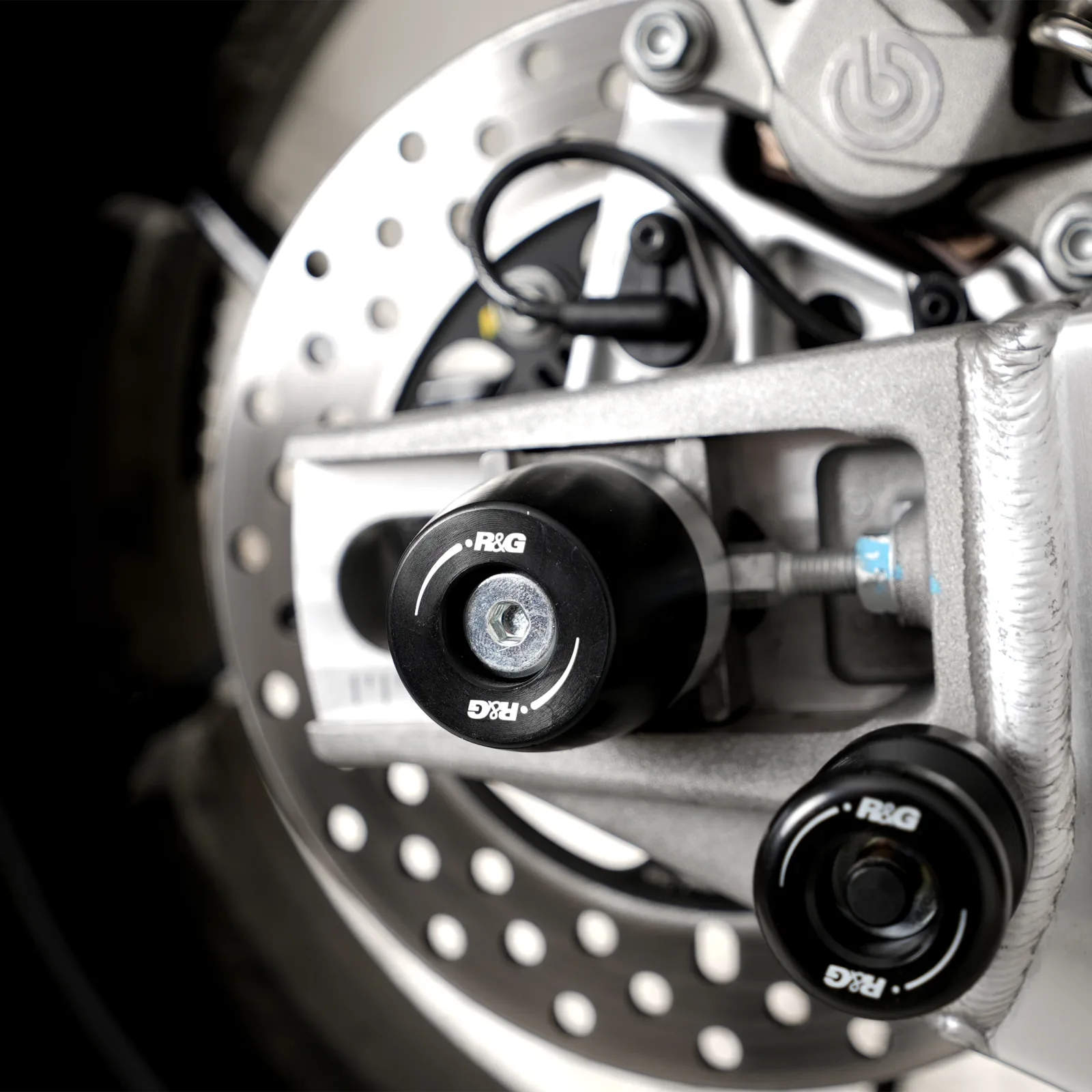 R&G Протектори за шарнир APEX за Aprilia Tuono V4 1100 RR (2025+), Tuono V4 1100 Factory (2025+)
