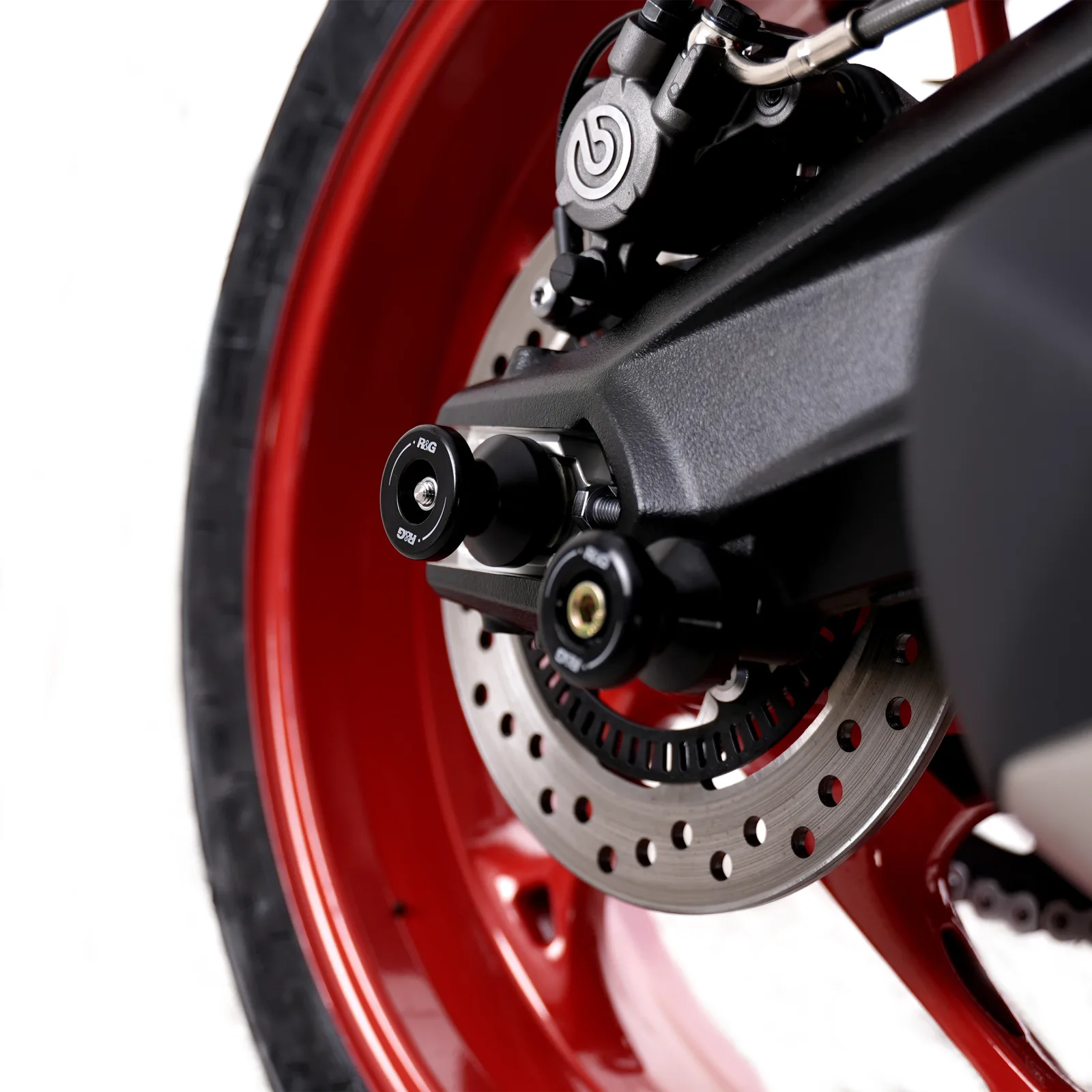 R&G Слайдери за ос за Triumph Daytona 675 (2006–2016), Street Triple 675 (2007–2012) и др.